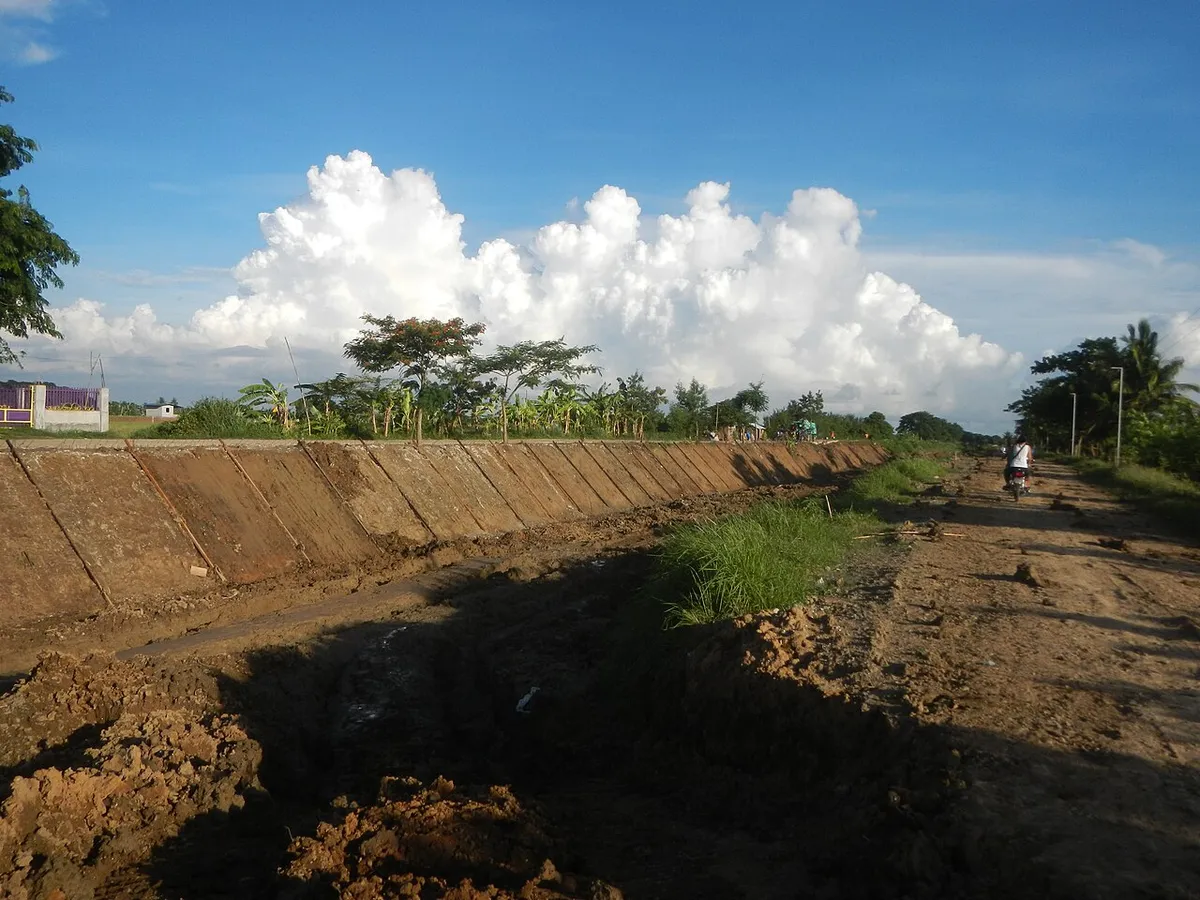 Concrete-lined irrigation canal under construction to stop seepage